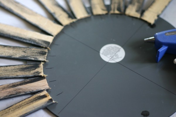 Paint Stick Sunburst Mirror Placement