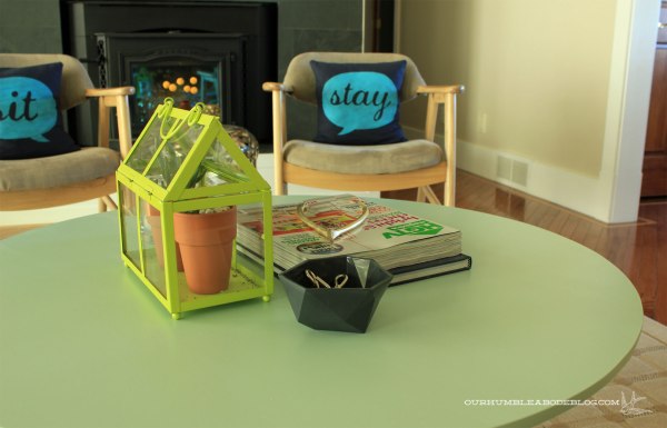 Gold-Clay-Wishbone-on-Coffee-Table-Pillows