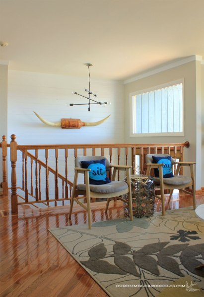 Finished-T-and-G-Plank-Entry-Wall-with-Railing