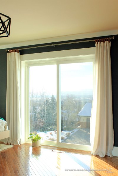 Leather-Tab-Top-Curtains-in-Master-Bedroom