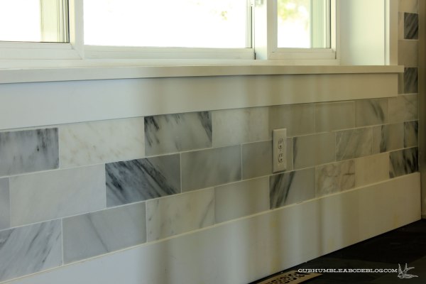 Marble-Backsplash-Under-Window
