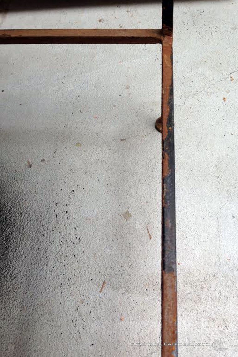 metal-side-table-rusted-leg