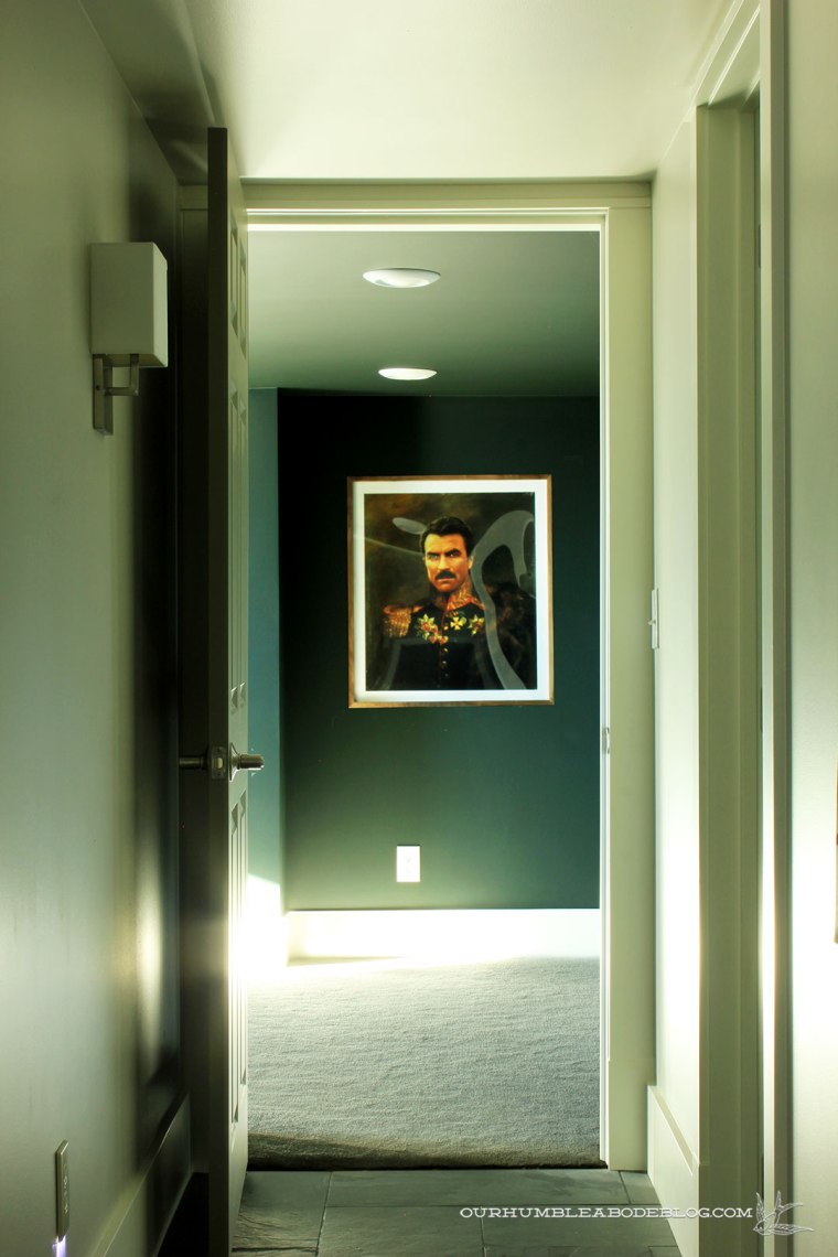 Walnut-Framed-Tom-Selleck-Print-in-Theater-Room