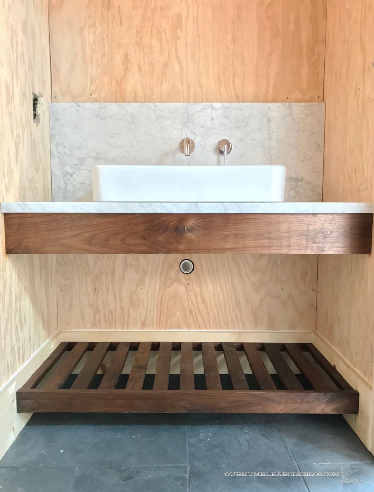 Pool-House-Bath-Marble-Backsplash-and-Sink-Installed