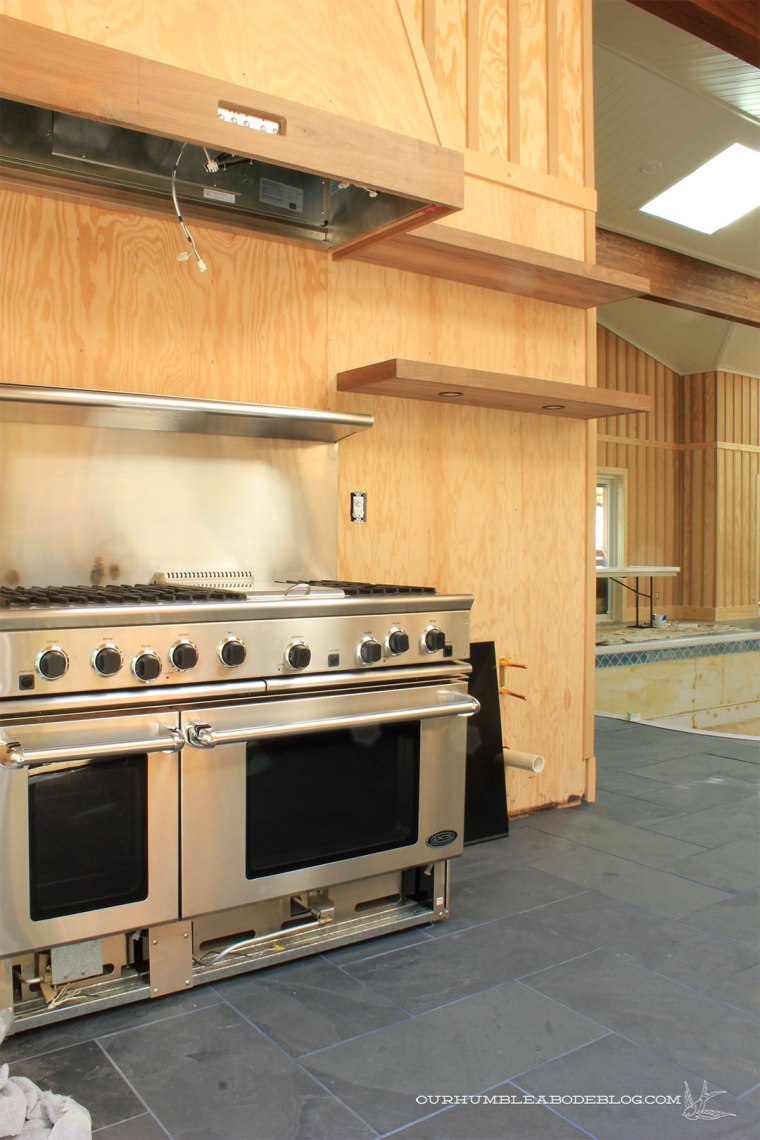Pool-House-Kitchen-Walnut-Shelves-with-Range-from-Door