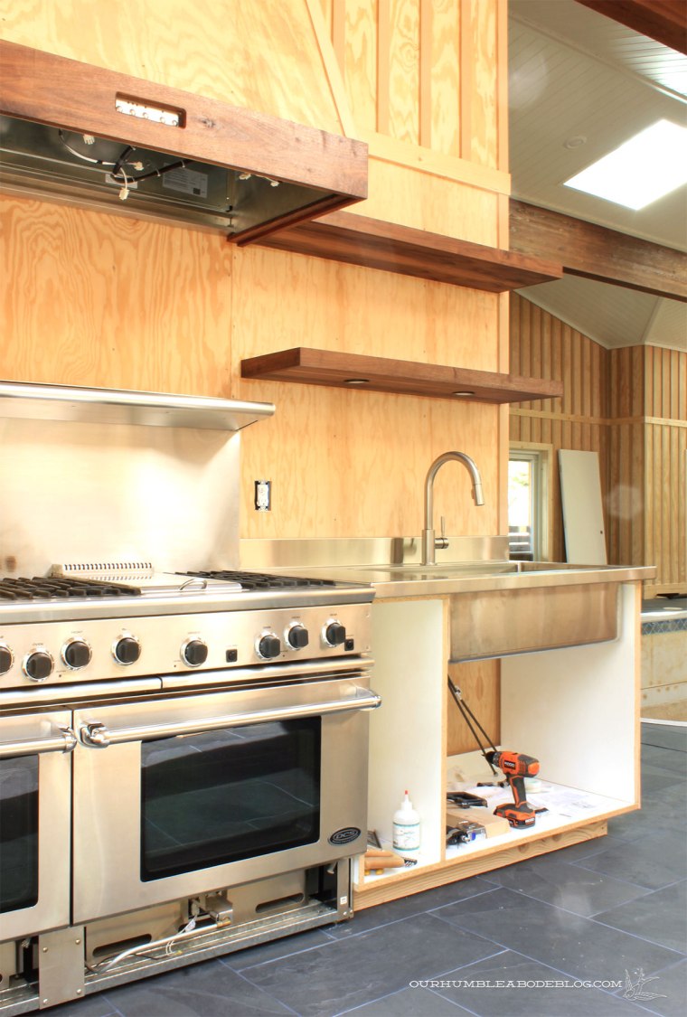 Pool-House-Kitchen-Stainless-Countertops-from-Door