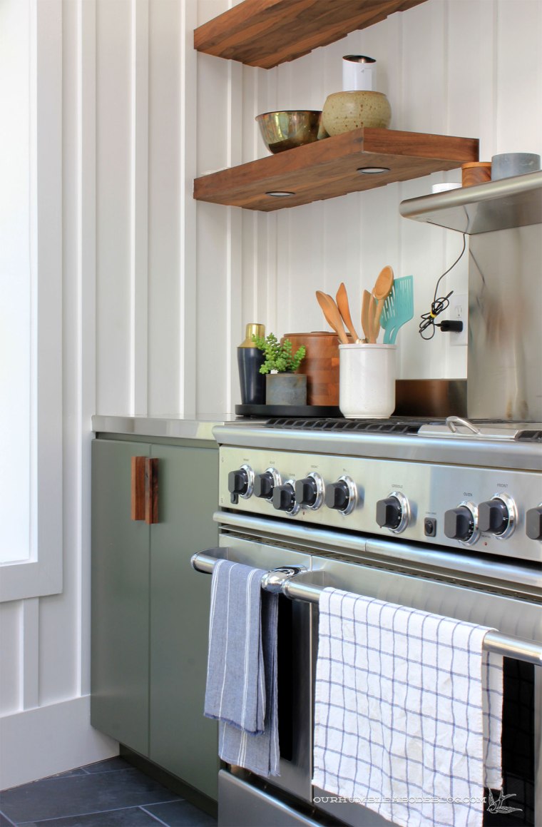 Pool-House-Green-Kitchen-Cabinets-with-Walnut-Handles-Left-Side-Detail
